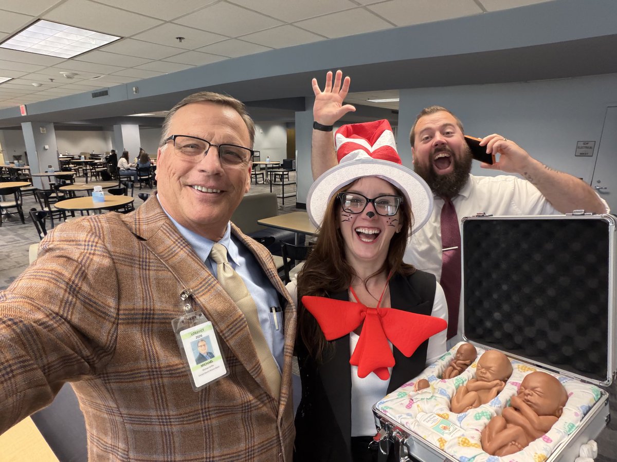 GaLifeAlliance's tweet photo. Here at GLA, we know a thing or two about show and tell. 🎩

So on #DrSeussDay, we sent The Cat in The Hat on a mission down to the Georgia Capitol …. with a briefcase full of fetal development models - to share with our legislature (and our friends at @AJCGaPolitics!) the science of when human life begins.   

Because Dr. Seuss spoke the truth when he wrote the famous words:

“A person’s a person, no matter how small.”

Under the Gold Dome, policy discussions can feel abstract and complicated. But human development is not either of those things. It’s simple. It’s real. It’s science. And it deserves to be seen.

Education matters. Truth matters. And yes - sometimes even dressing up as the Cat in the Hat can help make the point.

#APersonsAPerson #DrSeussDay #ReadAcrossAmerica #ProLife #gapol