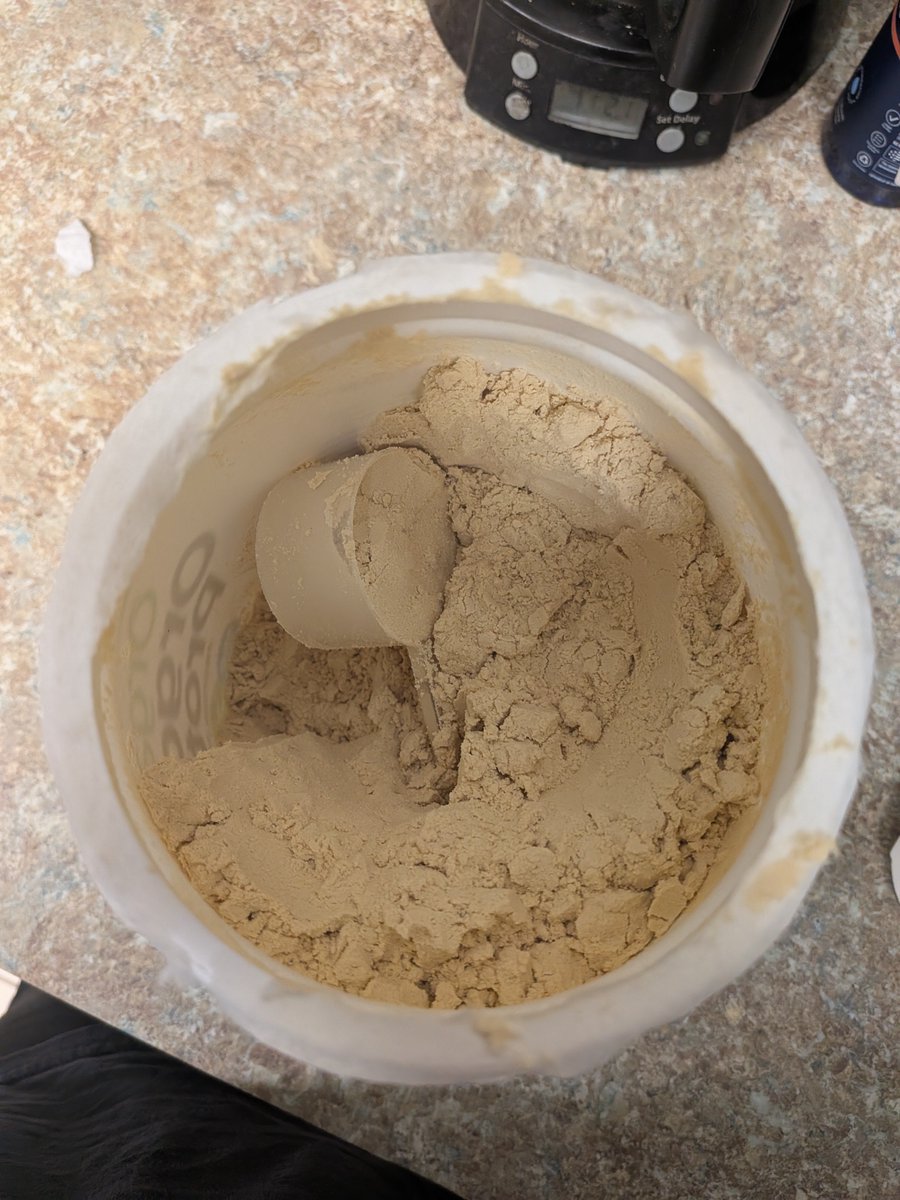 Any of my fellow gym / workout / fitness fanatics know of any unique hacks to retrieve the scooper from the bottom of a new jar of protein powder? Digging your hand to the bottom of it can't be the only solution.