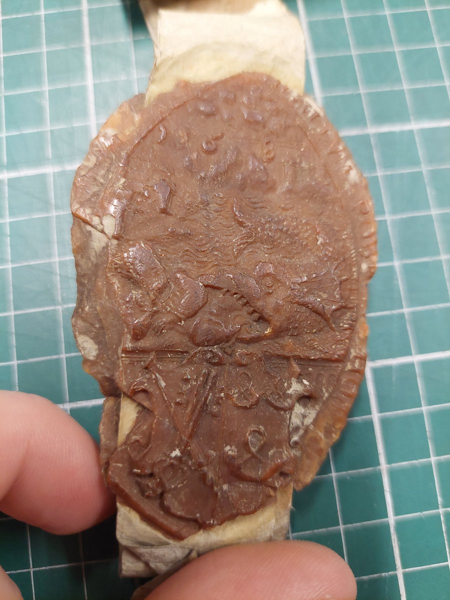 To mark this month's <a href="/explorearchives/">Explore Your Archive</a> theme of #Wildlife, we're sharing the seal of Robert Horne (Bishop of Winchester, 1561-1580), which depicts Jonah and the Whale 🐳 

The seal is from a document dated 1574, relating to the vicarage of Andover.