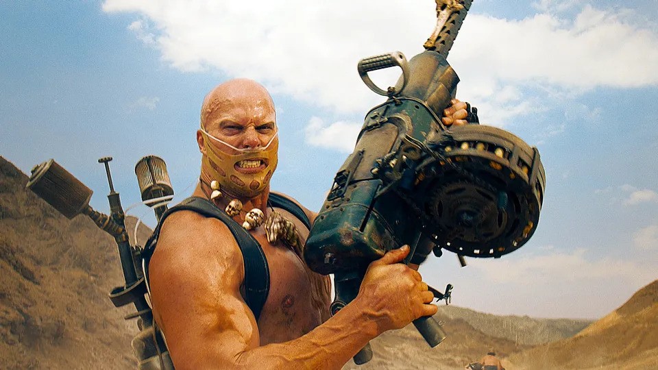 Cultaholic's tweet photo. Happy birthday to George Miller, screenwriter and director of the Mad Max franchise and Happy Feet.

Nathan Jones, who was originally scheduled to team with the Undertaker at WrestleMania XIX, appears in Mad Max: Fury Road and Furiosa as Rictus Erectus but doesn't appear in Happy Feet.