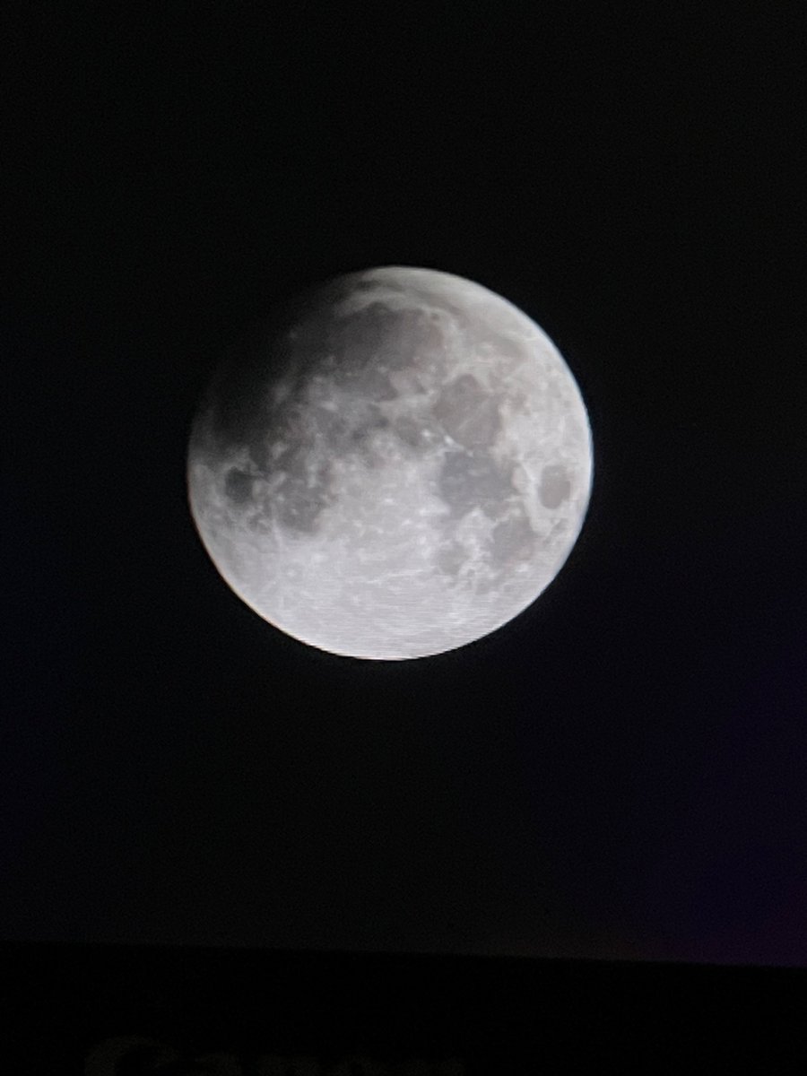 Edwelda's tweet photo. The sky is clear but cold! Partial phases of the eclipse.

@umlhawkwatch #astronomy #lunar eclipse #Eclipse https://t.co/B90Hi5oXzj