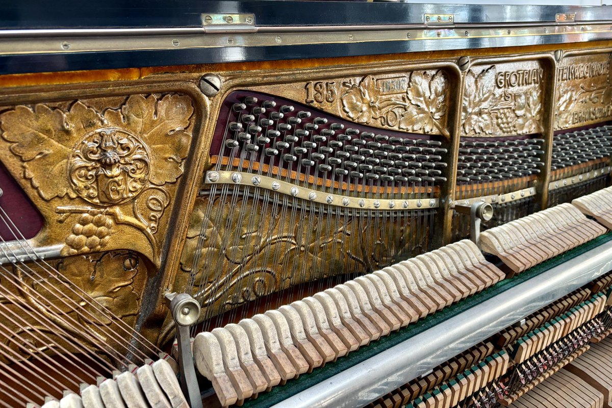 GoPianoTuning's tweet photo. Working on another 100 year old piano (103 to be precise!) and just look at how decorated the frame inside it. You never see this sort of thing today but it wasn’t exactly common back then either. https://t.co/XYqBPpdUYJ