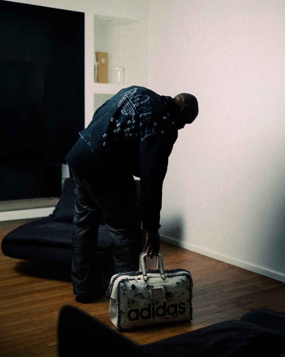 Djibril Cisse in his Adidas Originals jacket designed by Stan Birch 😍