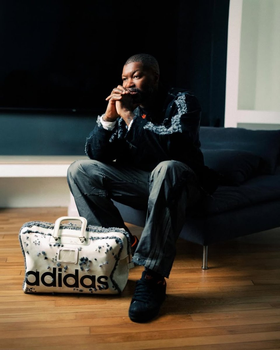 Djibril Cisse in his Adidas Originals jacket designed by Stan Birch 😍