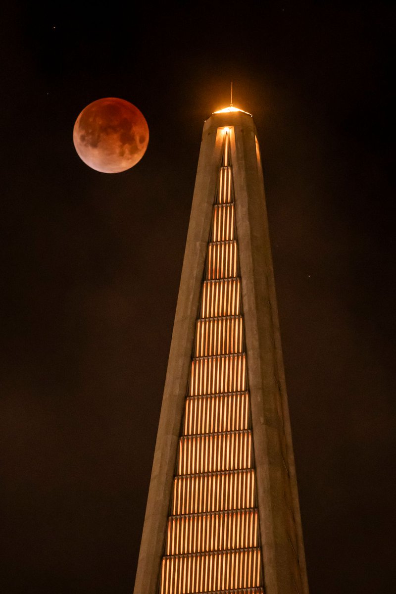The Worm Moon, the last full moon of winter, is visible near the Transamerica Pyramid in San Francisco as it goes into total eclipse, on Tuesday, March 3, 2026.