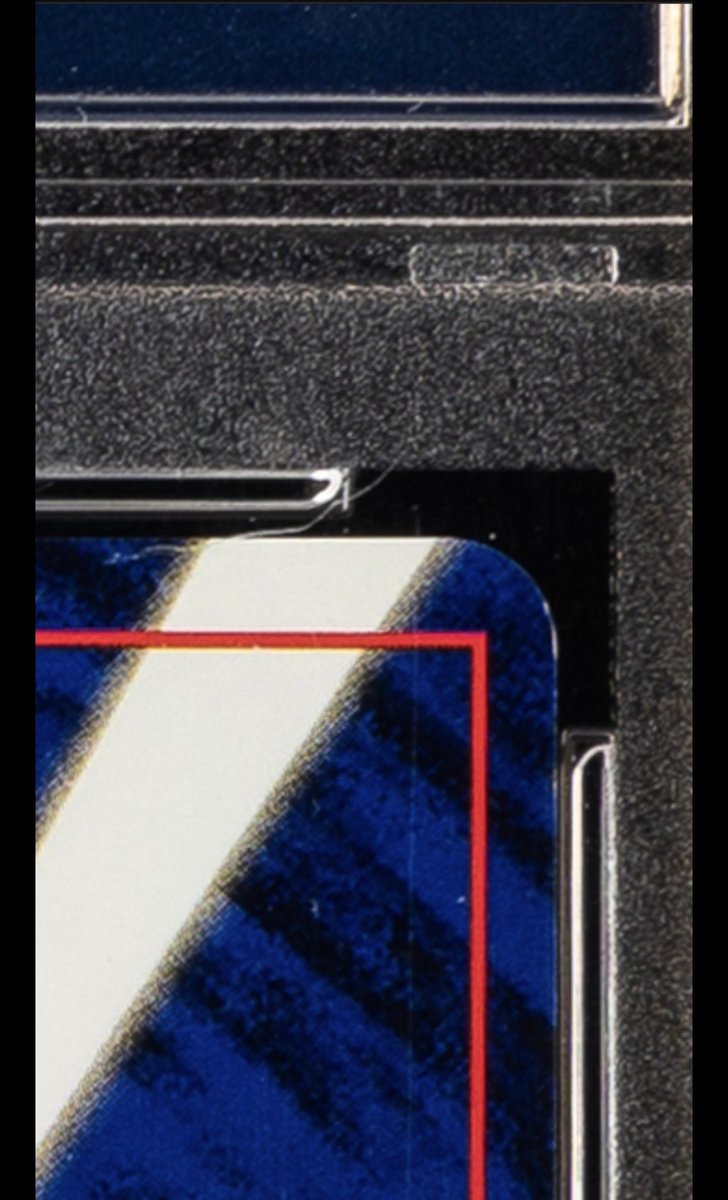 SecretExD's tweet photo. @JeremyCom @Jackkk The front is CLEARLY off centered and there’s whitening on the corners. Try again you clown https://t.co/Mvcvfr3DXh