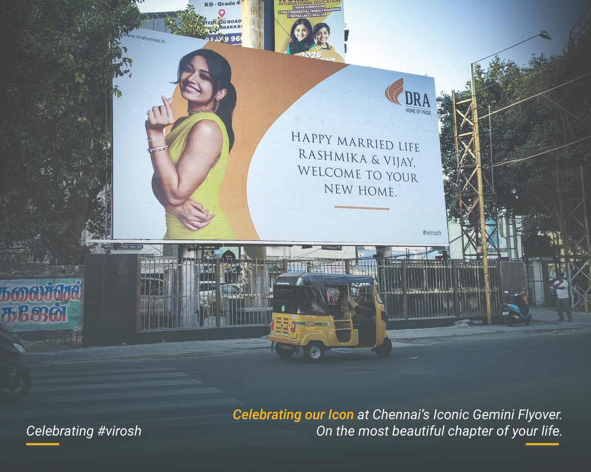 DRA_HOMES's tweet photo. At Chennai’s iconic Gemini Flyover, we celebrated our Icon on her most beautiful chapter with pride. 💛🏡
Happy married life. @iamRashmika @TheDeverakonda 
#DRAHomes #Virosh #HomeOfPride #Chennai https://t.co/GF2EyyabH5