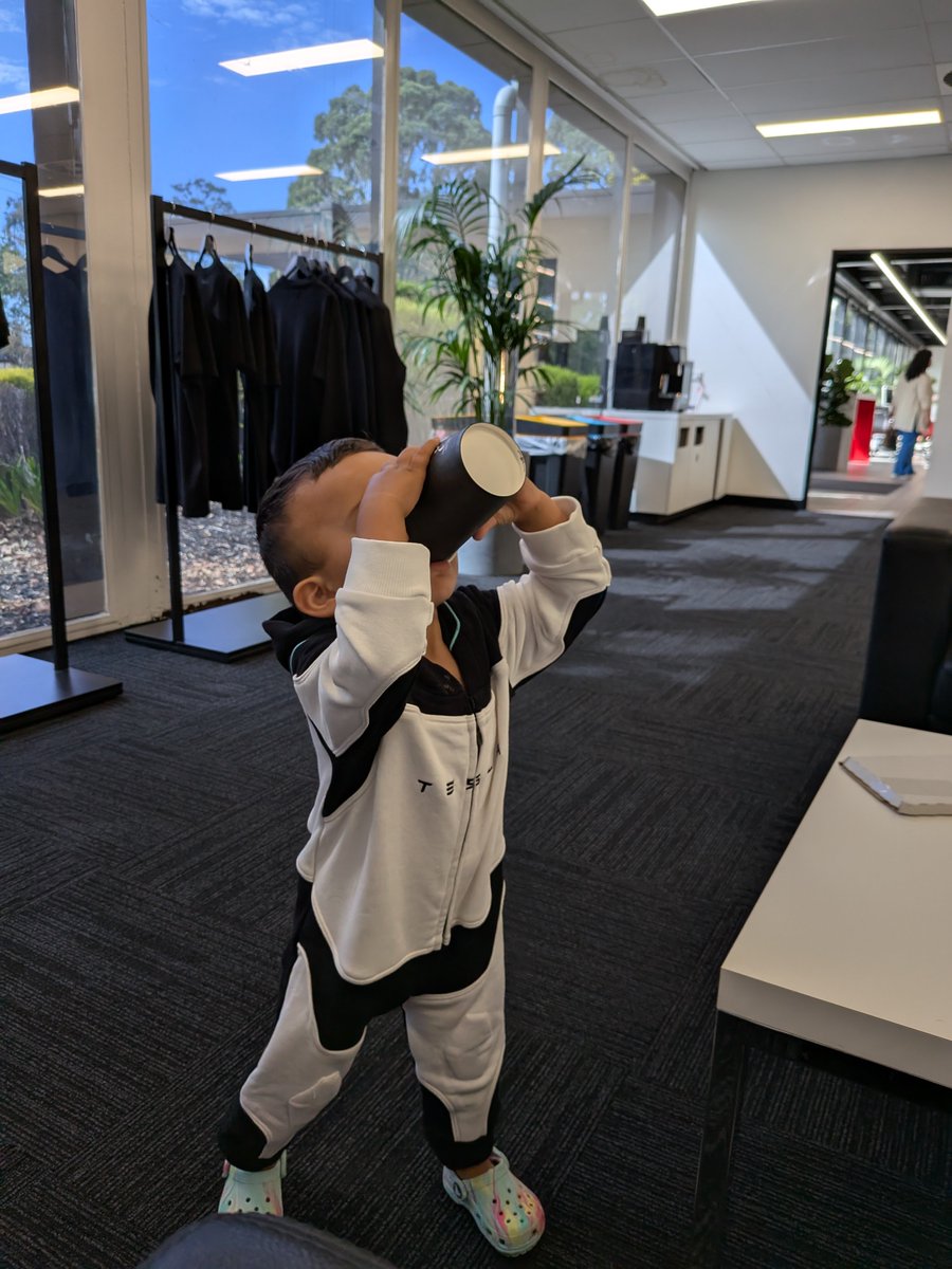 Keyur23488's tweet photo. @elonmusk Picked up our @Tesla Model Y at the Melbourne showroom last week and we're all in complete awe! Especially our 19-month-old little one suiting up as a mini Optimus 🚀⚡ Smooth drive, zero emissions, pure future. Thank you @elonmusk for this magic! Drive Tesla to feel the magic. If you can reply @elonmusk that will be an amazing gift when my baby grows up #Tesla #ModelY #TeslaFamily #FSD