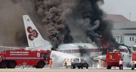 25YearsAgoLive's tweet photo. Thai Airways International Flight 114, a Boeing 737, explodes at the gate in Bangkok due to a fuel tank malfunction. 

One crew member, a flight attendant, is killed. https://t.co/89ip8O4kPw