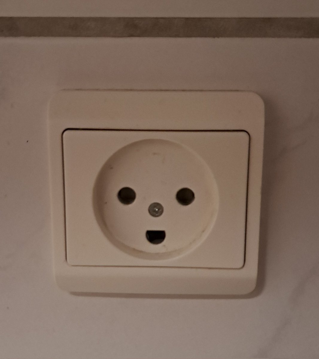 pullkickswim's tweet photo. It can be tough being away from my family during the days I'm in Denmark, but at least the power sockets in my Danish apartment always seem happy to see me. #Denmark #Danish #danishlife https://t.co/usexsGdQe4