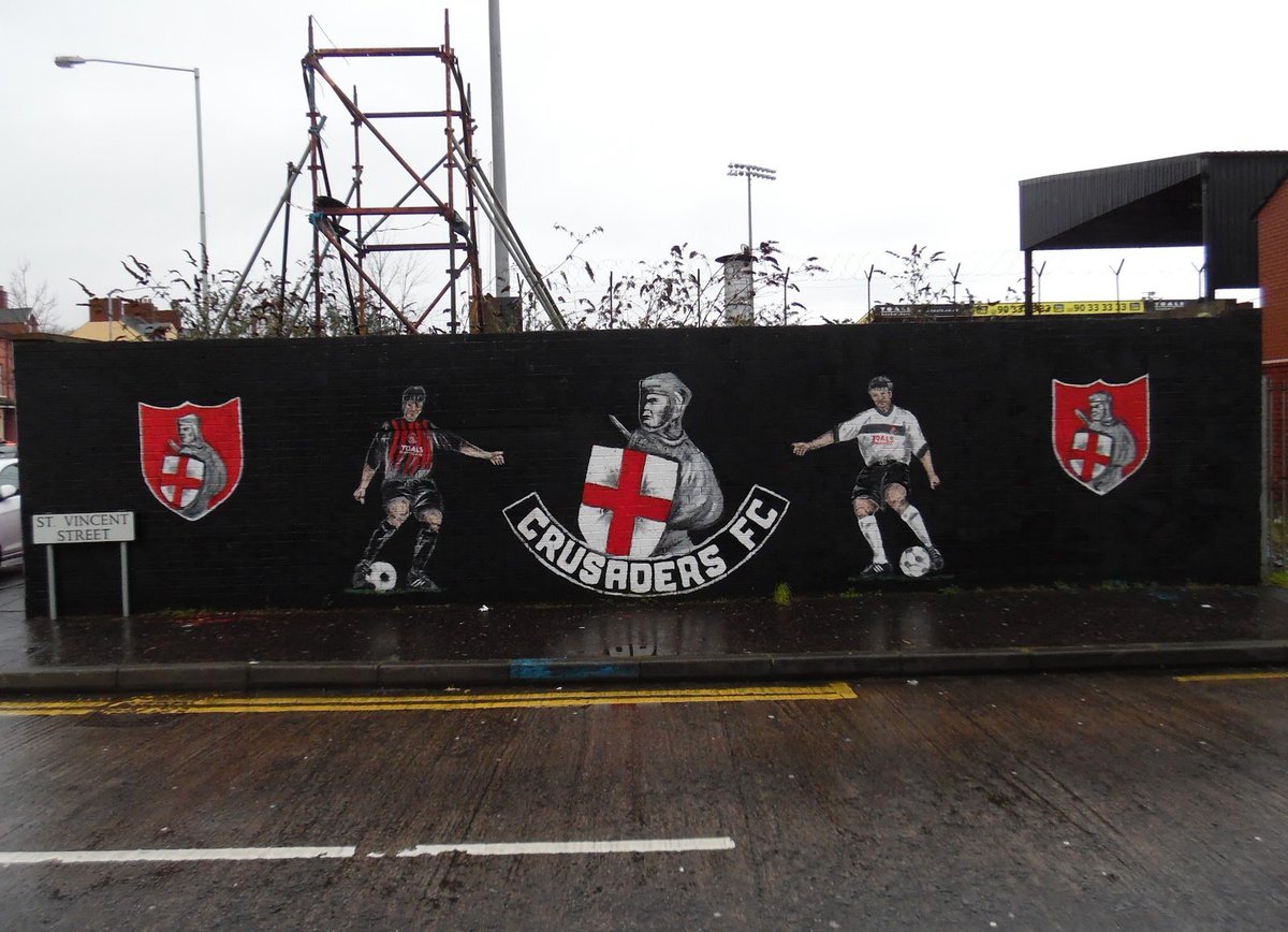 B_Crossley's tweet photo. @NIFLGrounds Used to be a cool mural before UVF one appeared few years ago. Was very disappointing, don't know how it came about. https://t.co/ixZSBuupzy