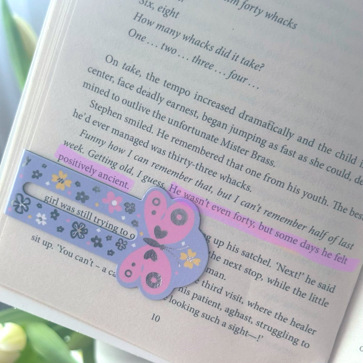 barbie on a bookshelf tweet media