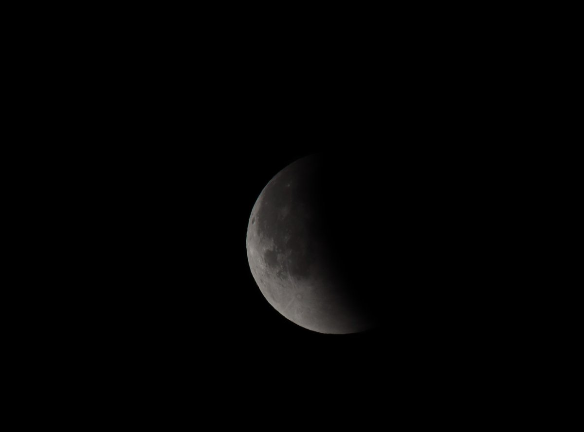 Pix406's tweet photo. This morning's #lunareclipse.  Couldn't get the colors to come through, but you get the idea.  #Montana 🌓 https://t.co/v3SvIR6yaN