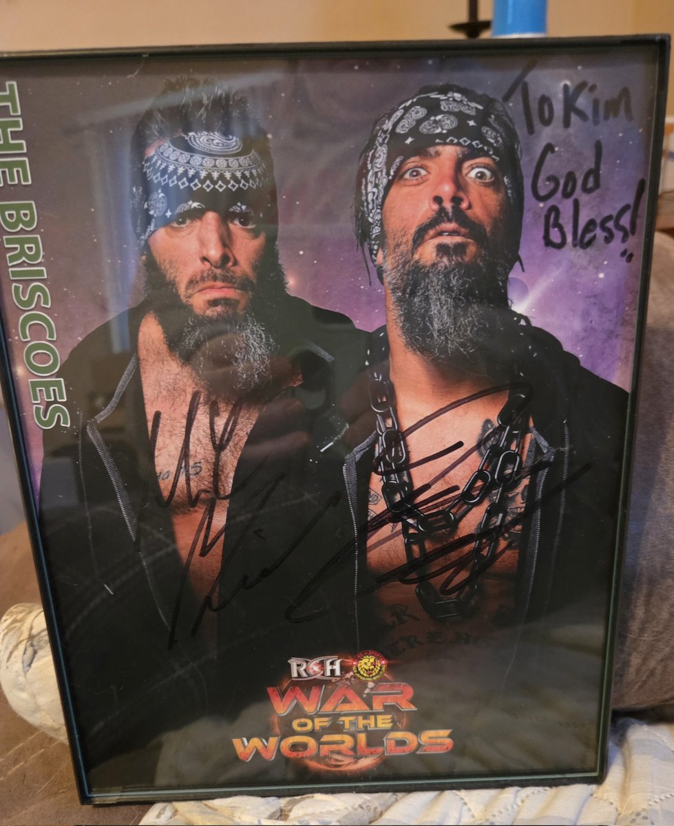 KimD1978's tweet photo. We are moving. While packing up our wrestling collectibles room, the next item to get wrapped in love was a pic of #DemBoyz. We met both @SussexCoChicken &amp; Jay Briscoe. Both great guys. We all miss you, Jay  ❤️ https://t.co/ntdWyPL2Ri