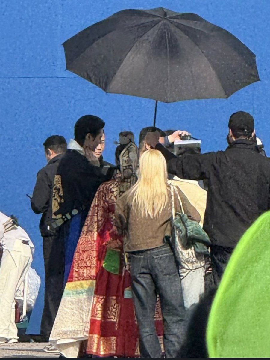 260304 | Photo of Byeon Wooseok &amp; IU clearer front view version from filming Perfect Crown.. They’re enjoying discussion filming so much… even photo is a bit blurry can still see chemistry 🫣🥳
#PerfectCrown 
#21세기대군부인