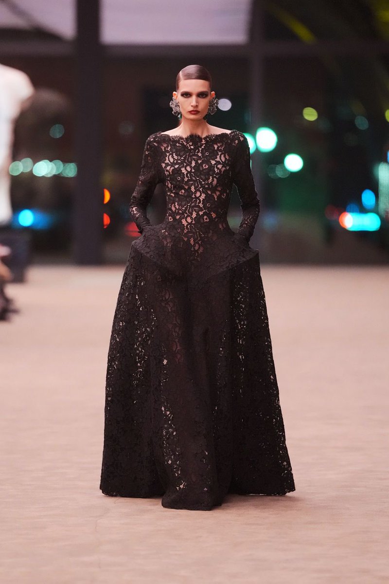 If this is the Saint Laurent bride then that’s exactly how I would capture her walking down the aisle, laughing off modesty in the chicest way possible wrapped in lace and nothing else underneath (fw26).
