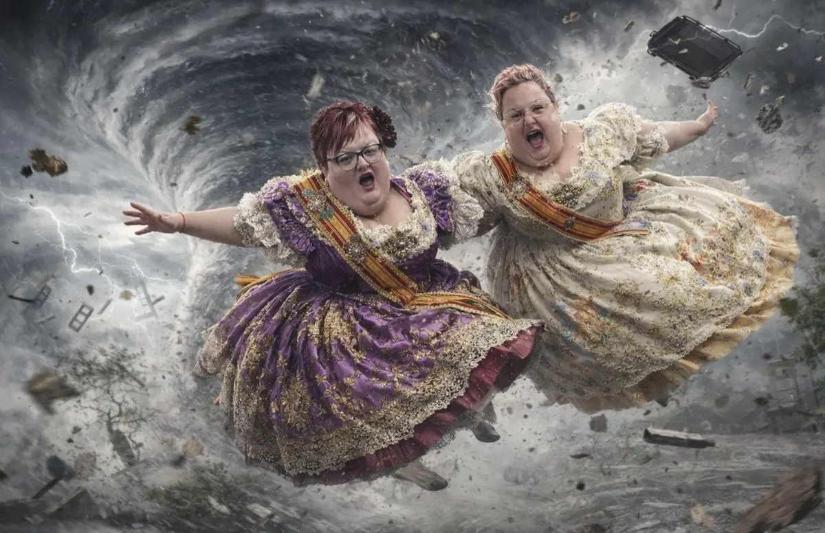 alsapremium's tweet photo. the 'chochos' twins getting sucked by a tornado while wearing traditional 'fallera' dresses https://t.co/d5bj5k0UwI