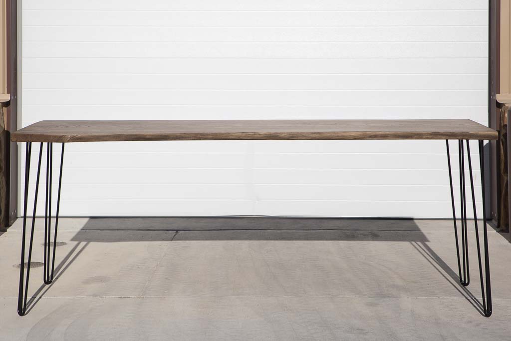 A modern industrial dining table with the most mesmerizing grain! 😍 

Craftsmen Tables used a gorgeous white oak slab for the top and paired it with hairpin legs! To color and protect the tabletop, Oil Plus 2C "Black" was applied.

MORE: bit.ly/4cpVSW0

#rubiomonocoat