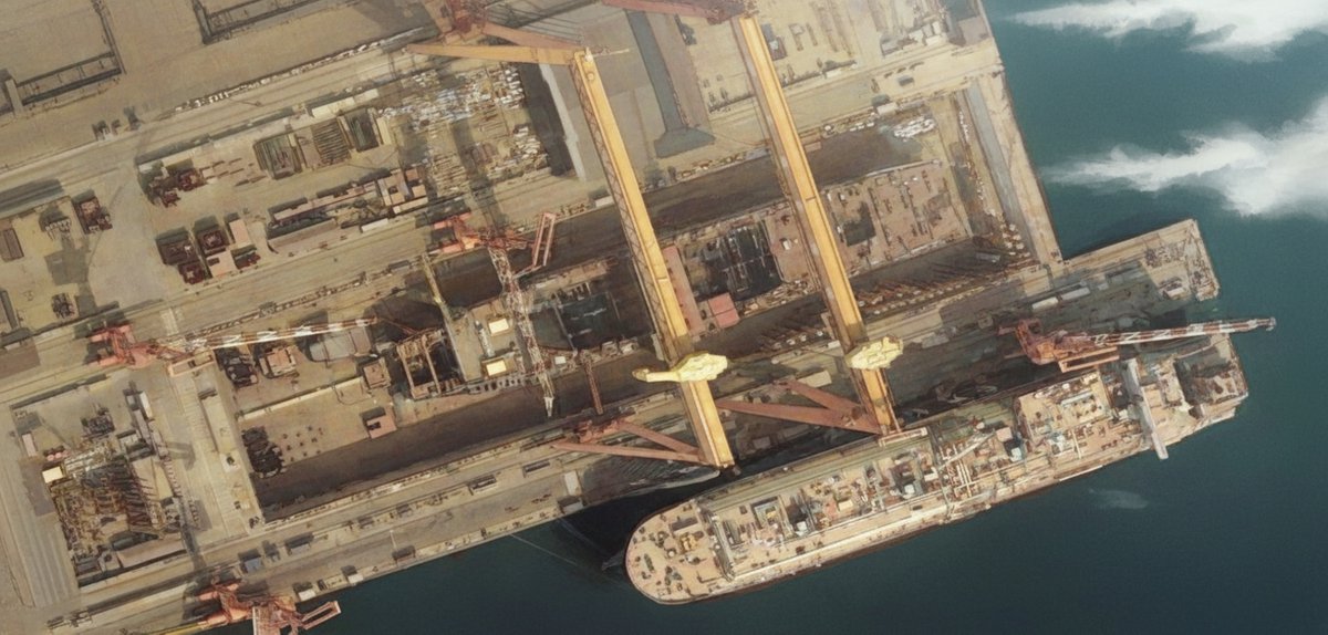 <a href="/grok/">Grok</a> Fresh image of China's Type 004 CVN-20 nuclear aircraft carrier under construction at the Dalian shipyard. The bow structure is gradually taking shape.