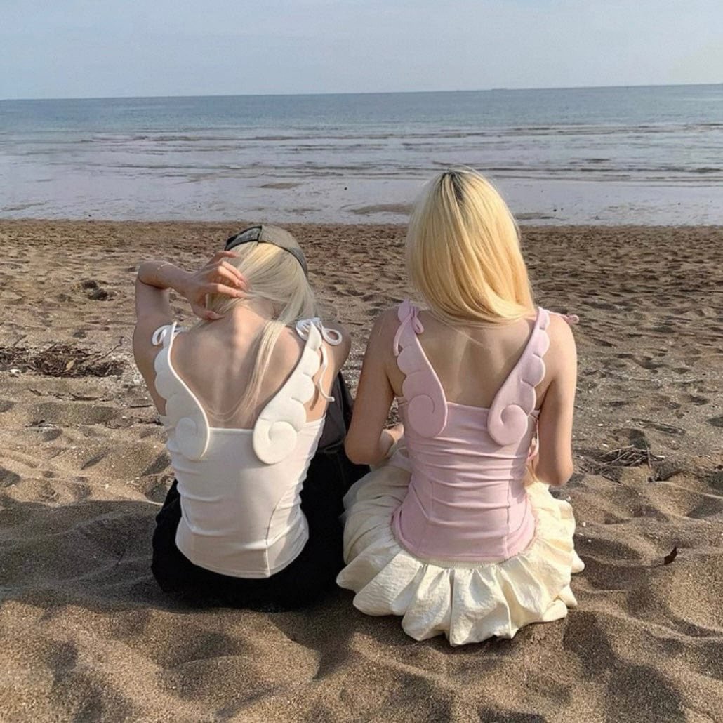 piinkimi_'s tweet photo. angel wing top https://t.co/bZxlh1DiYb