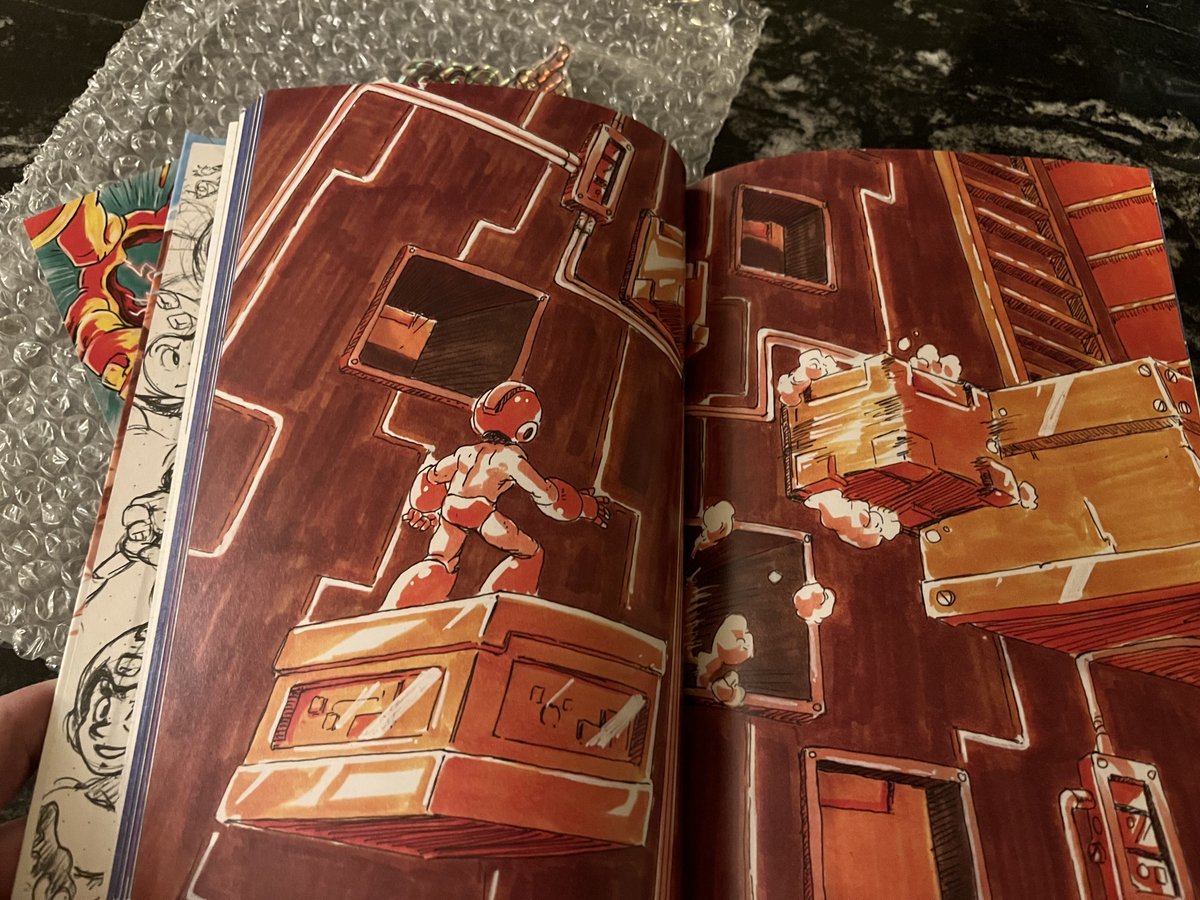 jeremdow's tweet photo. ⁦@heyphilsummers⁩ late to the party but I just got my Mega Man guide, and it’s gorgeous! So well done, I love it! https://t.co/V0uhYpjmYc