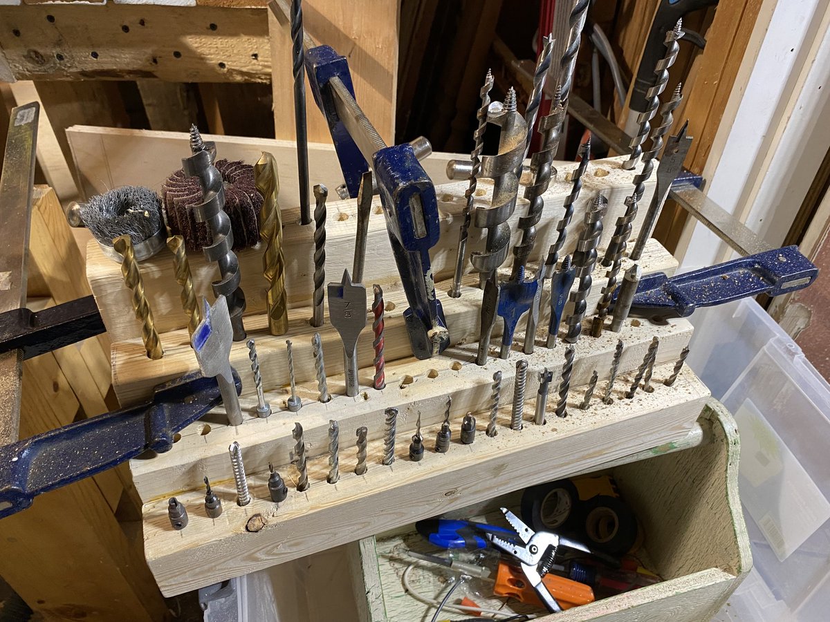 Trying to use as much scrap lumber in my workshop as I can to make more space. I used these junk 2×4s to make a quick drill rack for my workbench, but I have a lot more drill bits than this. So I'm going to have to make another one once I find all my bits.