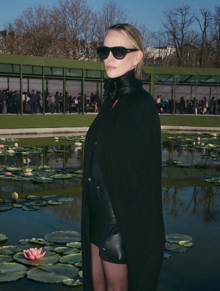 badpostcharlize's tweet photo. charlize theron in paris https://t.co/OZnr3Rm8iv