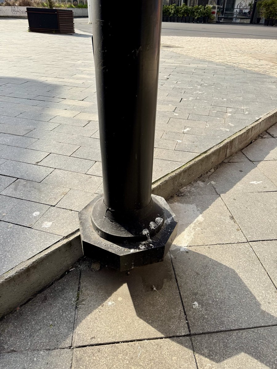 Walking in Skopje close to the Ministry of Finance. 
A lamppost defying gravity! Lots of work for the municipal authorities…