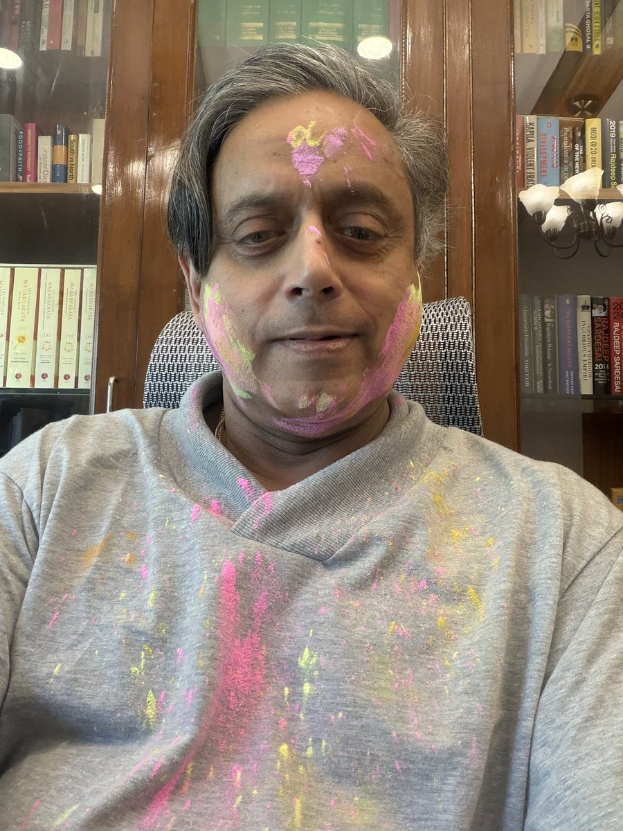 ShashiTharoor's tweet photo. I couldn’t escape the staff celebration! Off to shower now before I get too much gulal on my keyboard….

#HappyHoli ! https://t.co/FukQ4Rf6Du