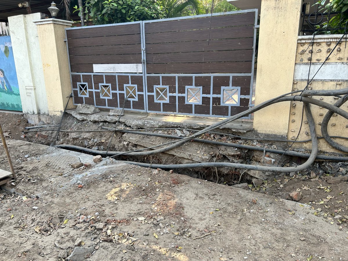 akrish1971's tweet photo. Recently storm water drain work was done at umayal Rd, Kilpauk. TNEB junction box is seen hanging precariously. The UG cable is tied up to a nearby tree. Even the post work clean up hasn’t been done properly. Request @chennaicorp to do the needful &amp; rectify this @TANGEDCO_Offcl https://t.co/f40DYcsTOC