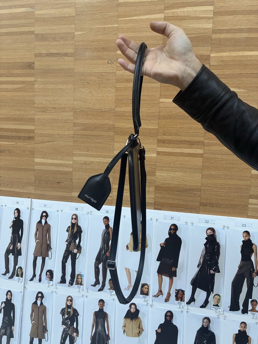 Front and side views of the new Courrèges Shadow bag: completely flat, but made of stretch jersey coated in leather, so you can actually slip a ton of stuff inside. Kind of genius.