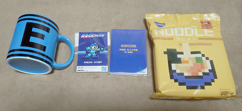 ゆーゆーさんからカプコン展のお土産のロックマングッズや便利アイテム