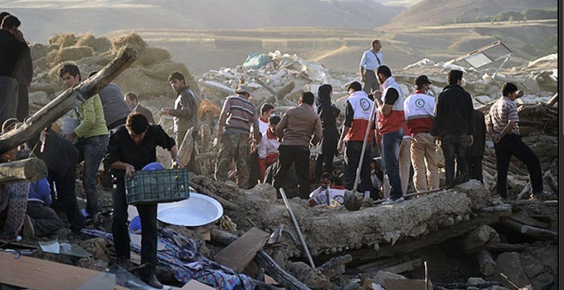 neshatahmadii's tweet photo. On February 18, 2004, a freight train carrying wool, ammonium nitrate, and other explosive materials began moving without a driver in my hometown, Neyshabur. After it derailed, firefighters rushed to the scene to put out the fire — unaware of what the train was carrying.

The result was a massive explosion, reportedly equivalent to a 3.2-magnitude earthquake. Around 300 local residents were killed, including the father of one of my friends.

Twenty-two years later, there is still no clear official explanation of what exactly was inside that train, why no proper warnings were issued, or who was ultimately responsible.

For many of us, this is just one of thousands of tragedies under the Islamic regime. People are exhausted. They say they would rather endure foreign pressure if it means finally seeing an end to this regime.

#IranMassacre #KingRezaPahlavi