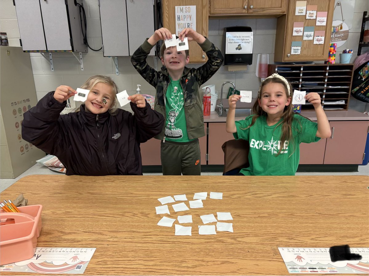 rmfisher76's tweet photo. These 1st graders are having a blast playing the memory game, matching different ways to tell time! ⏰👦👧 Not only is it fun, but it also helps improve their focus, memory, and critical thinking skills. #MathRocks @MVESGainesville 🕰️⏱️⌚️ https://t.co/Y1CYB7pNwa