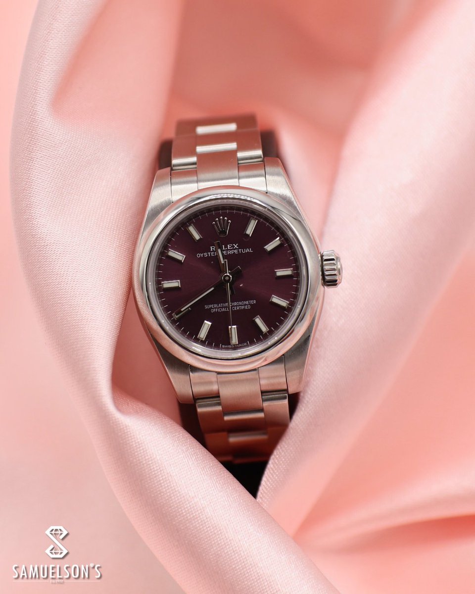 This Rolex Oyster Perpetual 26 Stainless Steel Red Grape Ladies Watch brings classic elegance with a bold pop of color. 

A little statement. A lot of style. ✨

Shop here: samuelsonsdiamonds.com/shop/product/r…