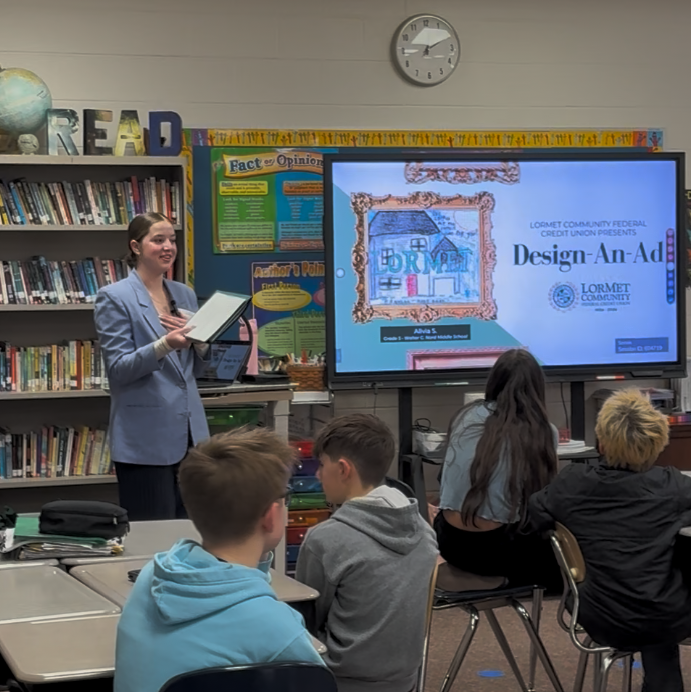LorMetCU's tweet photo. Our team had a great time connecting with students from @AJHComets this week through @YourChronicle's Design-an-Ad program. Lindsey and Jennaya visited Mrs. Sexton’s class to share what makes LorMet special as a credit union and inspire the next generation of marketers as they create their very own LorMet ads. One design will be published in the newspaper, stay tuned!