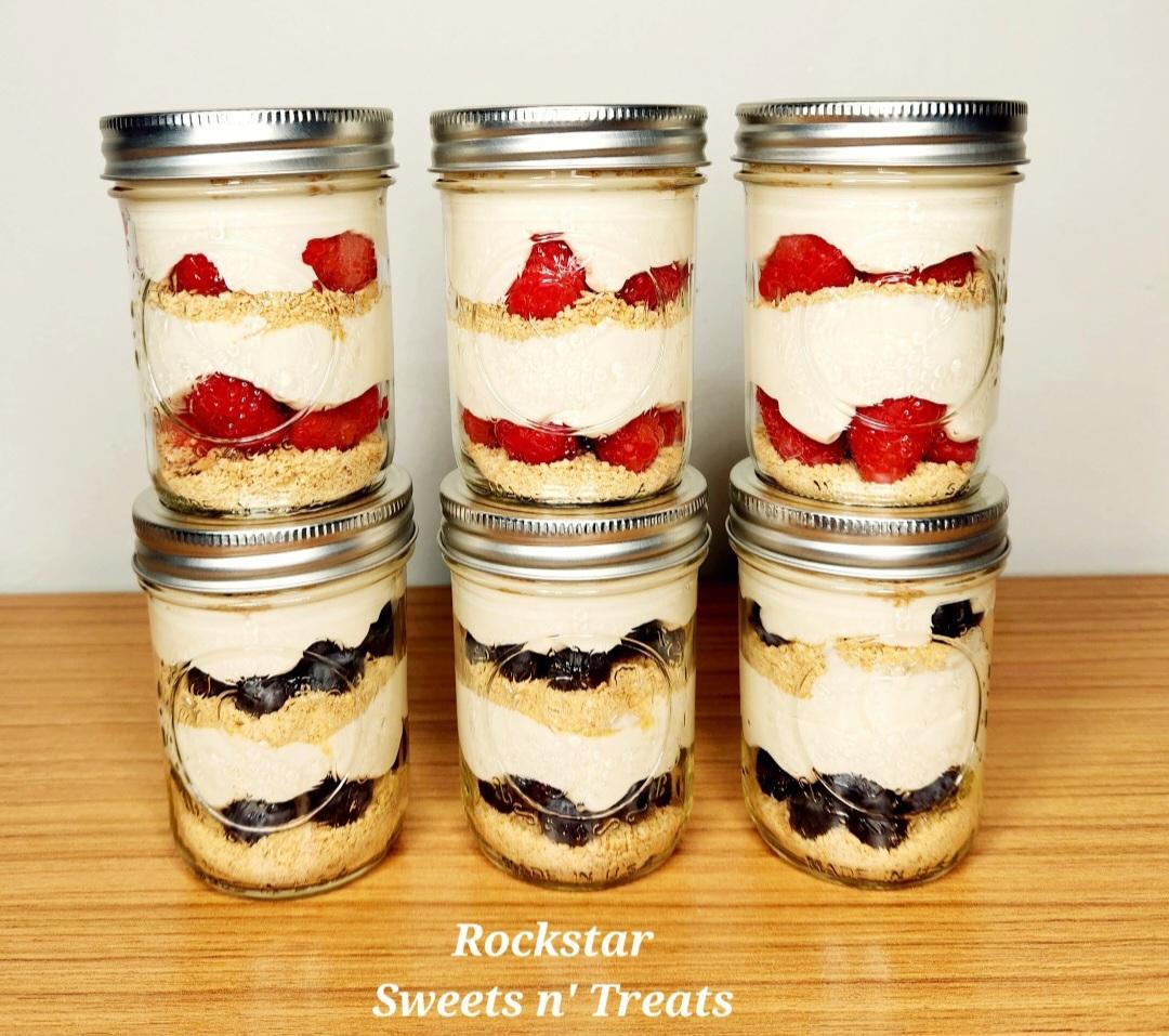 8 oz. No-bake cheesecake jars! Blueberry and Raspberry! 🫐😋 Layers of decadent cheesecake filling, crushed graham cracker crust, and fresh fruit! Available in 16 oz. Jars as well as plastic jars! Local delivery or pickup only!

☎️ Text 260-298-1590 to set up an order!