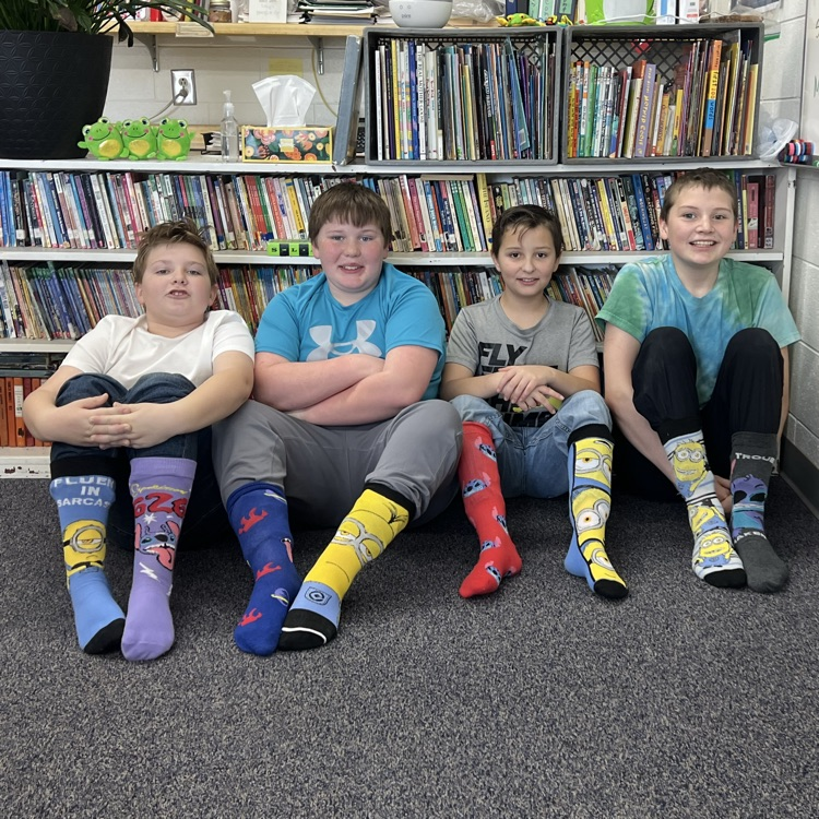 MCSTryon's tweet photo. "Reading Makes Me Unique". Rocking our mismatched socks for Read America Week! https://t.co/NIrxBBtJno