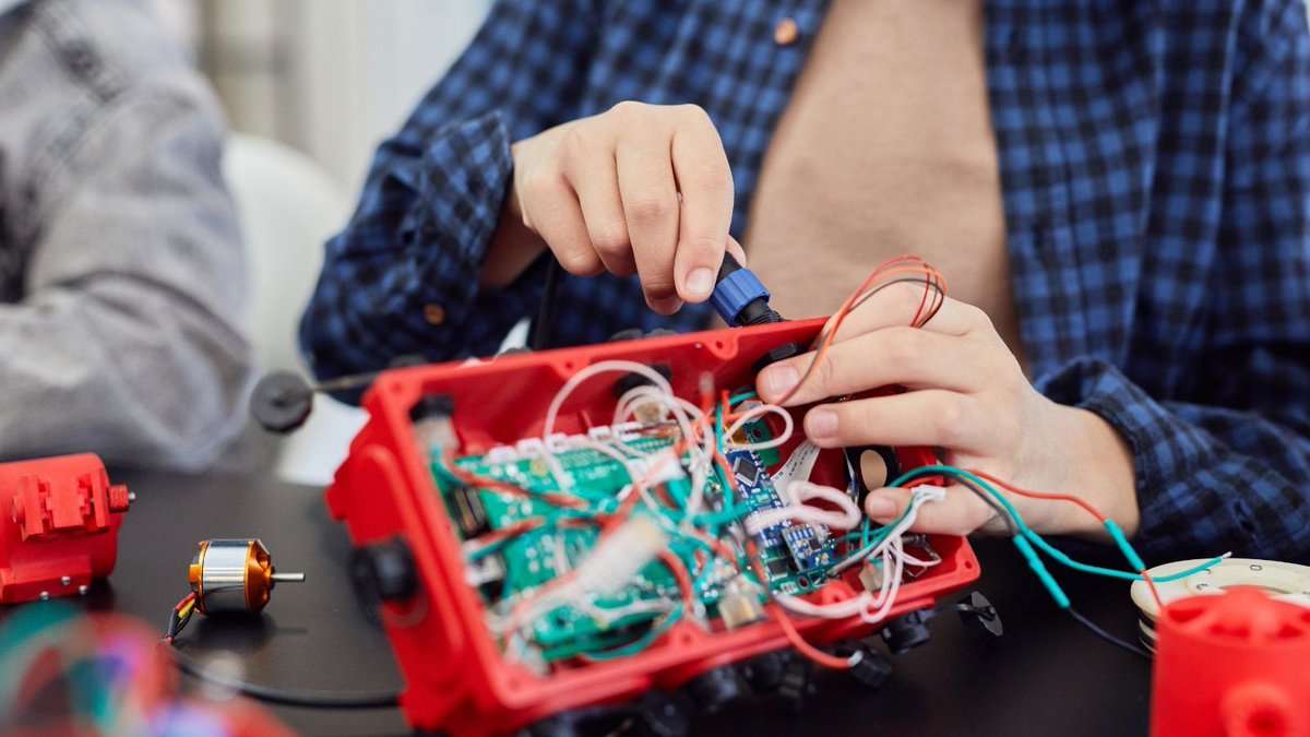 Saturday solder squad.  
Prototype passed?  
Send the drawer chip.  
1 card → 5 women empowered  
13 kg CO₂e spared.  
All steps: makers.sd4.africa  
#MakersForChange