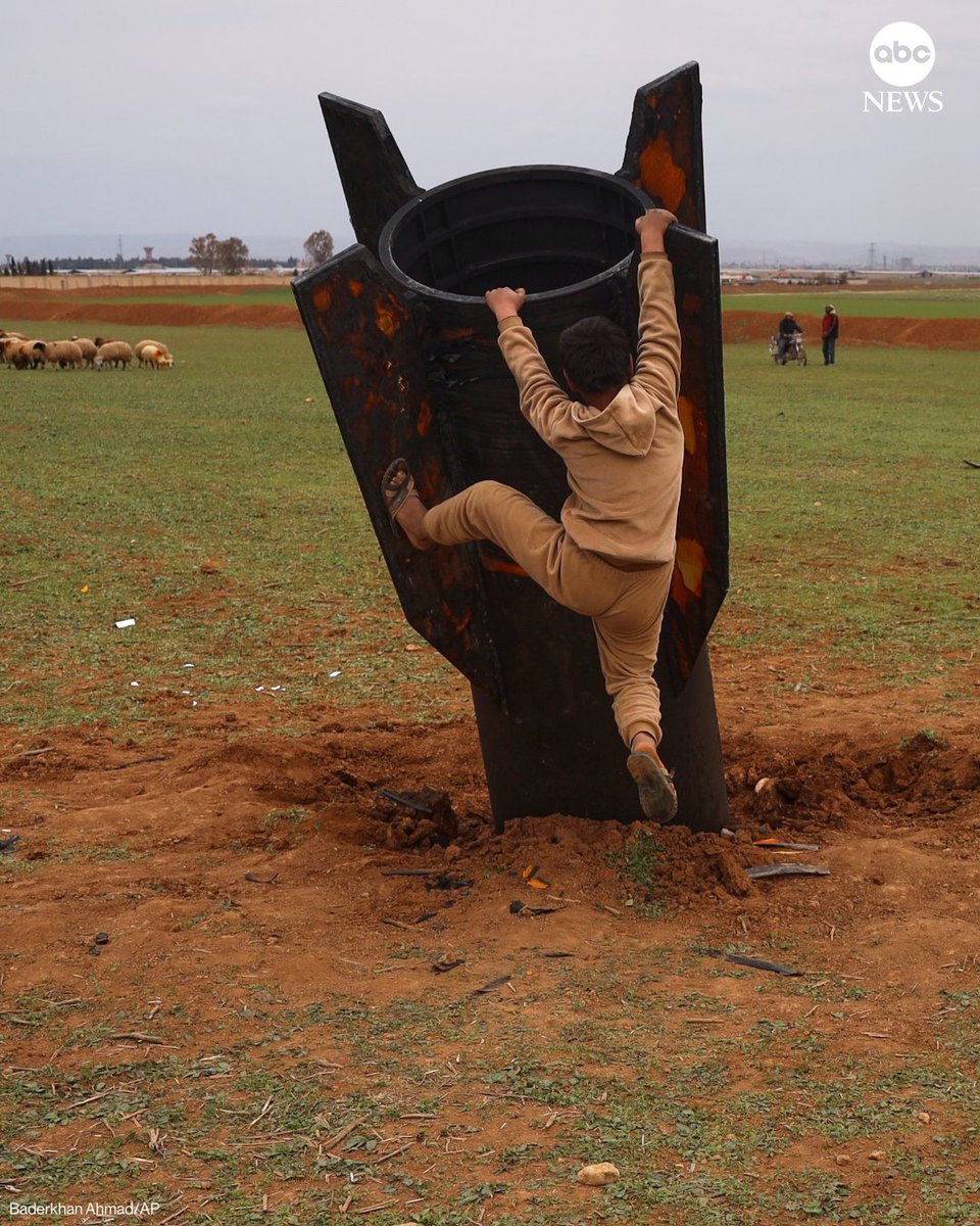 ABC's tweet photo. An unexploded projectile landed in an open field in the outskirts of Qamishli, eastern Syria.

Images show people, including children, standing near the Iranian-made missile on Wednesday. One photo shows a boy trying to climb on the missile. https://t.co/cxfrbvD9ks