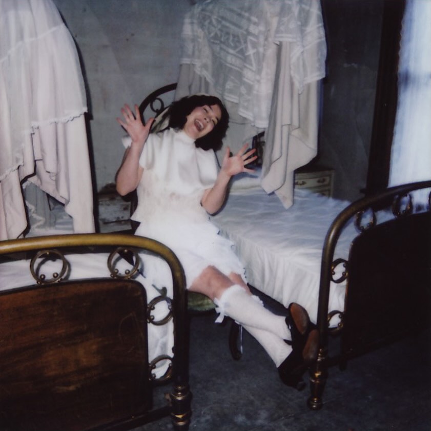 Mitski photographed behind the scenes of the “If I Leave” music video  
📷 | cheyenne cody