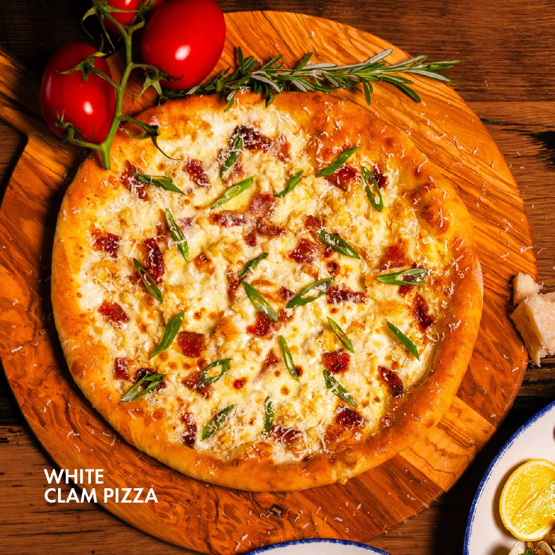 Our White Clam Pizza is loaded with little neck clams, garlic, mozzarella, provolone, pecorino, bacon, and green onions, a perfect balance of savory and fresh coastal flavor.

Reserve your table: bit.ly/3lASAUM

#BravoItalianKitchen