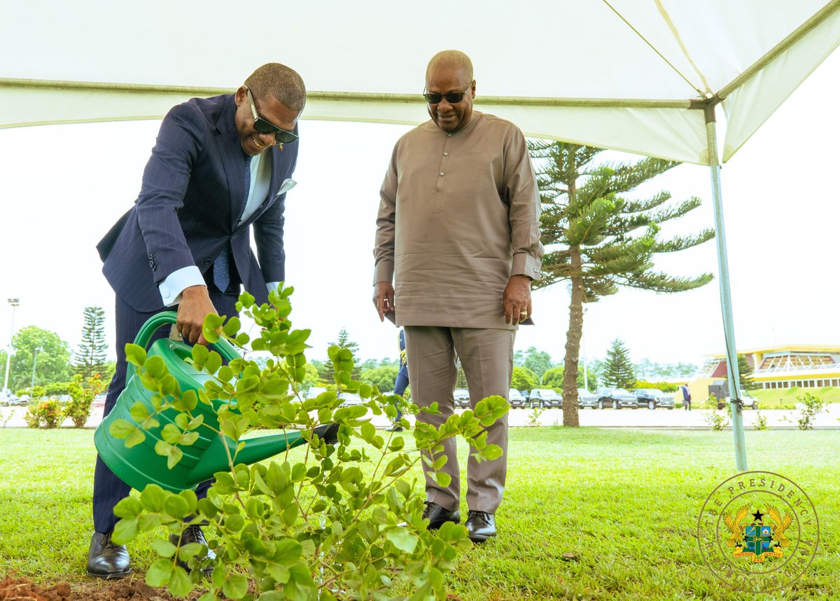 JDMahama's tweet photo. I took a stroll in the Presidency Garden with Prime Minister Terrance Drew of Saint Kitts and Nevis after our bilateral meeting today. 

He planted the ‘tree of life’ in the garden to commemorate his visit. https://t.co/D27x3ddnC5