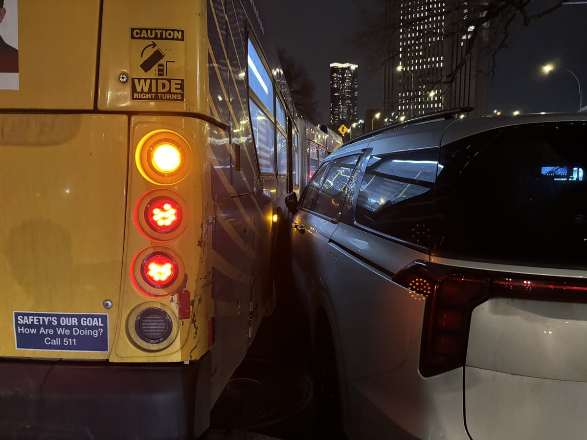 Somebody with an NYPD placard illegally parked a personal car right by the Brooklyn Bridge. The bus hit the car trying to get around it, now traffic is backed up for blocks and blocks and several express buses full of people can’t get to the FDR.