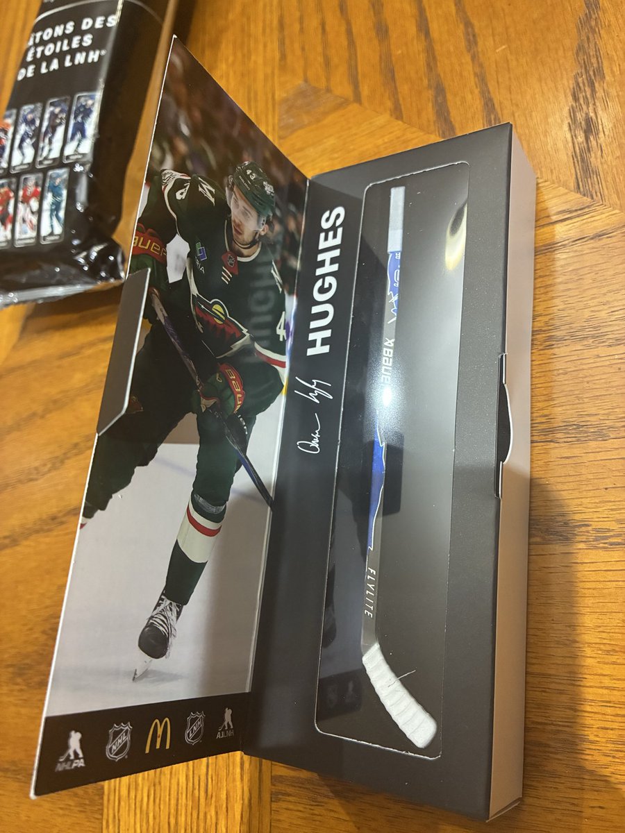 AGBRSports's tweet photo. MCDONALD’S MINI STICK UNBOXING 

So, on the outside of the @McDonaldsCanada packaging Quinn Hughes is clearly in a Vancouver Canucks jersey 

But his stick and photo inside is  Minnesota Wild themed lol https://t.co/6tkYadJiVa