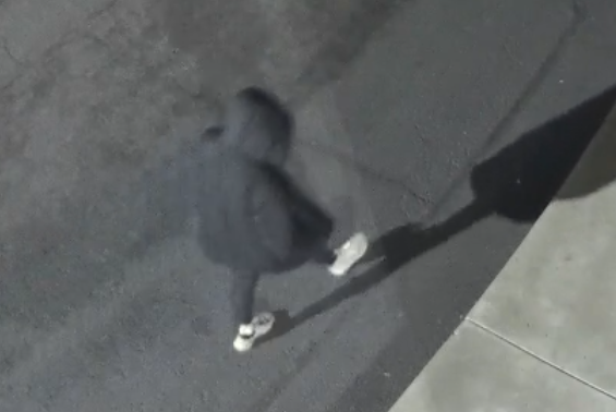 PoliceGap's tweet photo. Detective Jimenez is investigating an arson that happened in the early morning hours on 03/03/2026 in the 1400 block of S 14th St.  Attached photos are those of the suspect, seen in the shadows of a surveillance camera, setting cardboard on fire. The fire damaged part of the building. Estimates of the damage are not known yet.  Suspect is male, wearing white shoes, black pants, and a black puffy jacket.  If you have information on the identity of this person, please call 509-248-0430 or send your tip to Crime Stoppers at 1-800-222-(8477) or https://t.co/vPu7mx1Umm. 26U000835