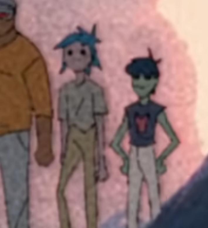 murdoc looking all grumpy in the music video yet he becomes all smiley when he's near his boyfriend