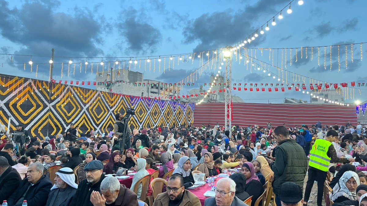 Play4Palestine's tweet photo. Playgrounds for Palestine co-sponsored a collective iftar for Gaza’s orphaned children.🌙

Lanterns, laughter, clowns, and a shared meal — small moments of joy that remind these children they are not alone. https://t.co/jDBU64DmuS