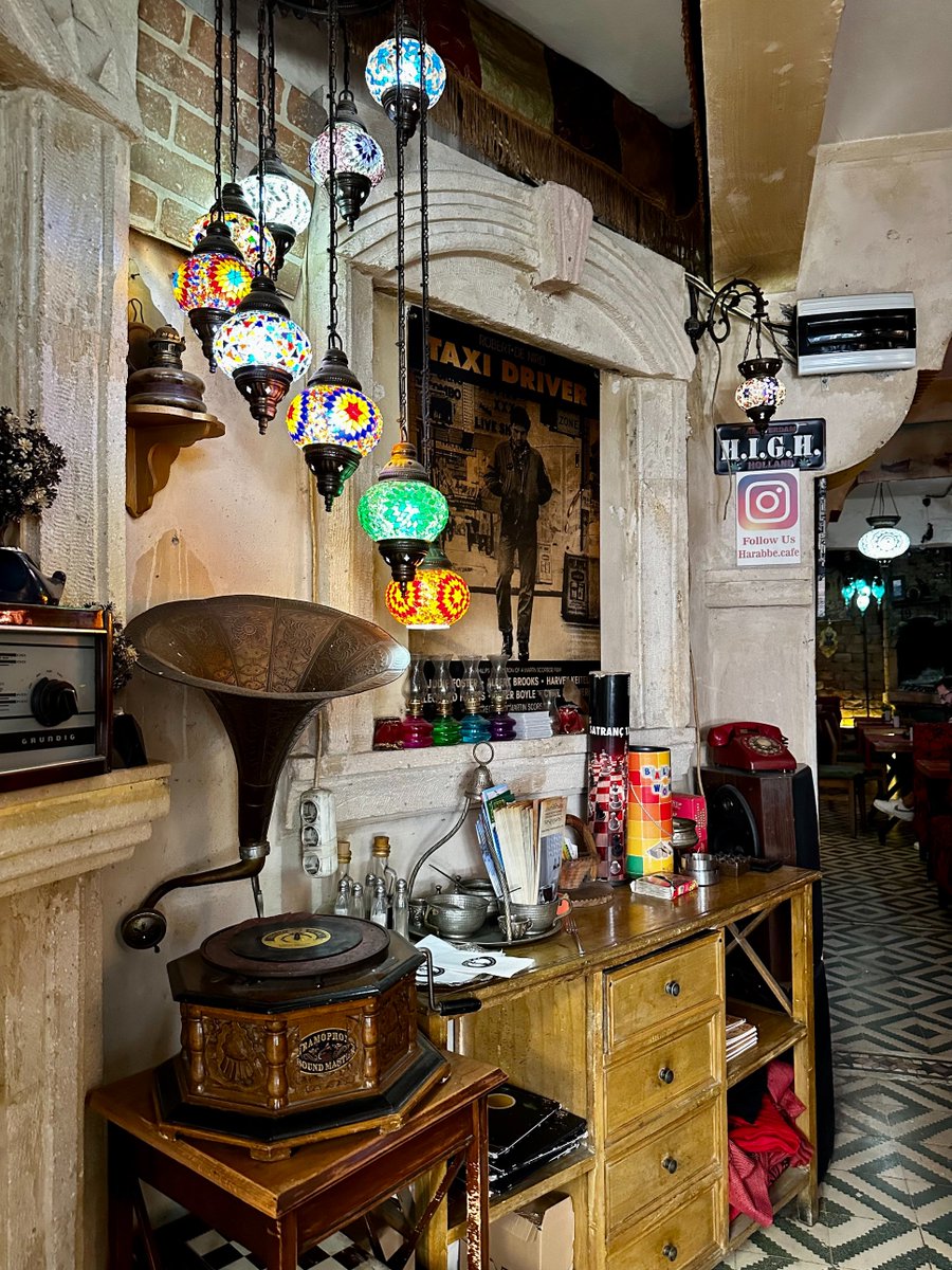 HarabbeCafe's tweet photo. Some places don’t just serve drinks, they serve atmosphere.
At Harab’be Cafe, every corner tells a story — from the vintage gramophone to the colorful Turkish lamps lighting the night. ✨
#harabbecafe #sultanahmet #istanbulnights #istanbulcafe #turkishlamps #vintagevibes https://t.co/Gl63RXIyZb
