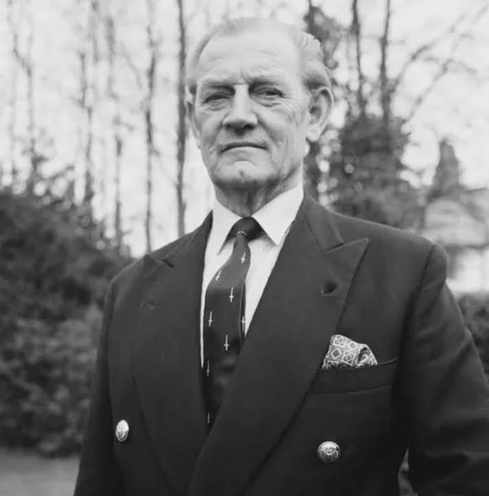 The only person to make a confirmed kill with a longbow in WWII was an officer called 'Mad Jack' Churchill. He Fought only with a Sword, Longbow, and carried Bagpipes. 

Lieutenant Colonel John Malcolm Thorpe Fleming “Mad Jack” Churchill is one of the most legendary — and